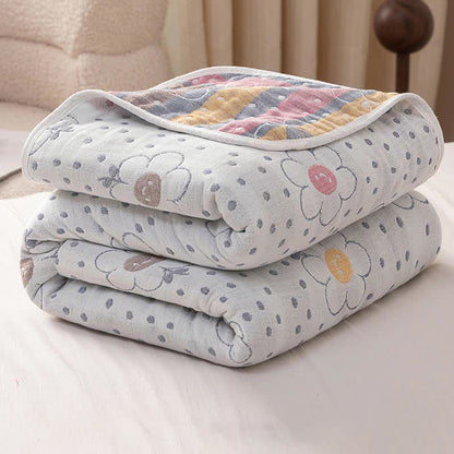 Couette réversible en coton à motif floral et à pois