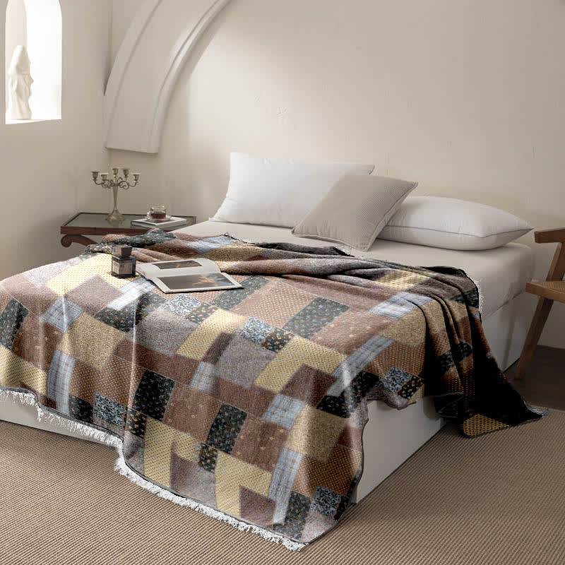 Couette patchwork en mousseline de coton avec pompons