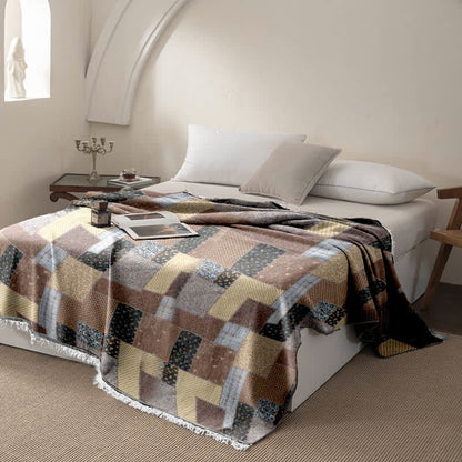Couette patchwork en mousseline de coton avec pompons