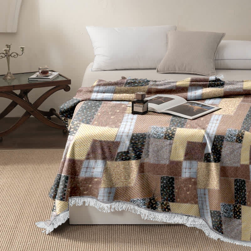 Couette patchwork en mousseline de coton avec pompons
