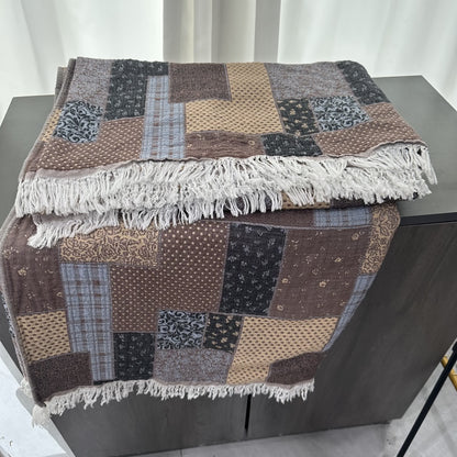 Couette patchwork en mousseline de coton avec pompons