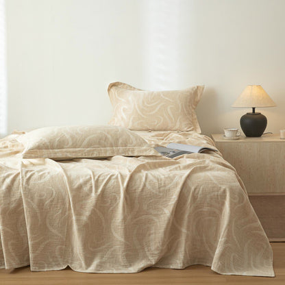 Couvre-lit beige en coton et lin texturé à motif incurvé