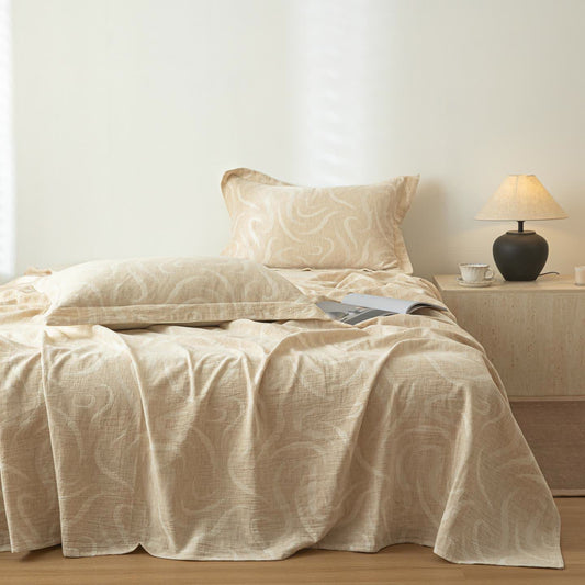 Couvre-lit beige en coton et lin texturé à motif incurvé