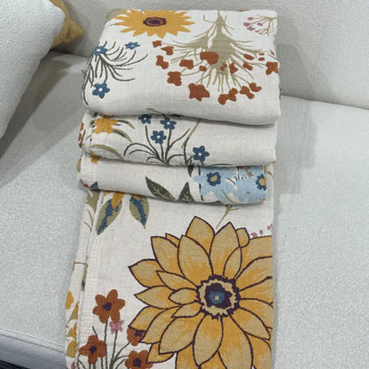 Couette réversible en gaze de coton avec des tournesols en fleurs
