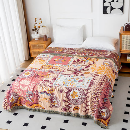 Couette réversible en gaze de coton à motif floral cachemire
