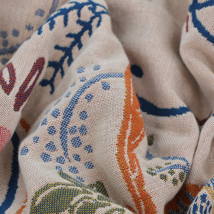 Couette en gaze de coton à motif floral géométrique
