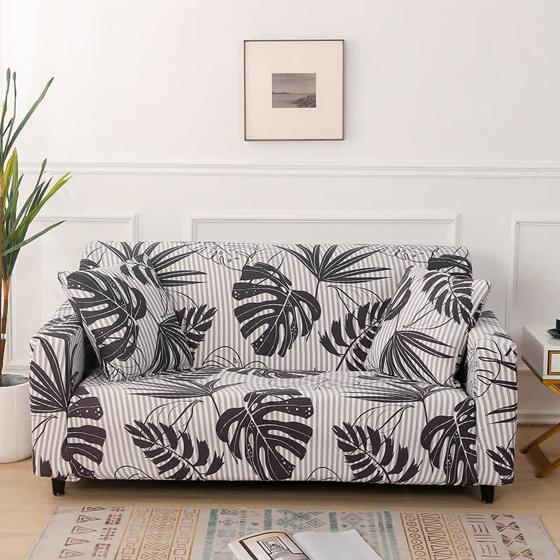 Housse de canapé extensible à imprimé monstera - 4 places 235cm x 300cm - image 1