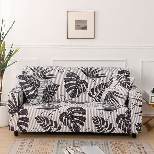 Housse de canapé extensible à imprimé monstera - 4 places 235cm x 300cm - image 1