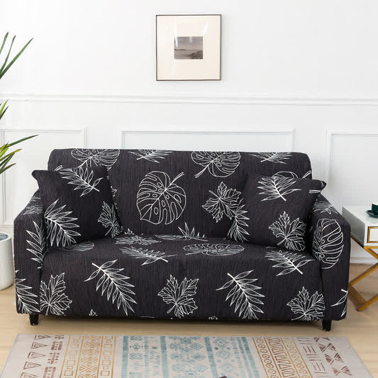 Housse de canapé extensible noire à imprimé monstera - 4 places 235cm x 300cm - image 1