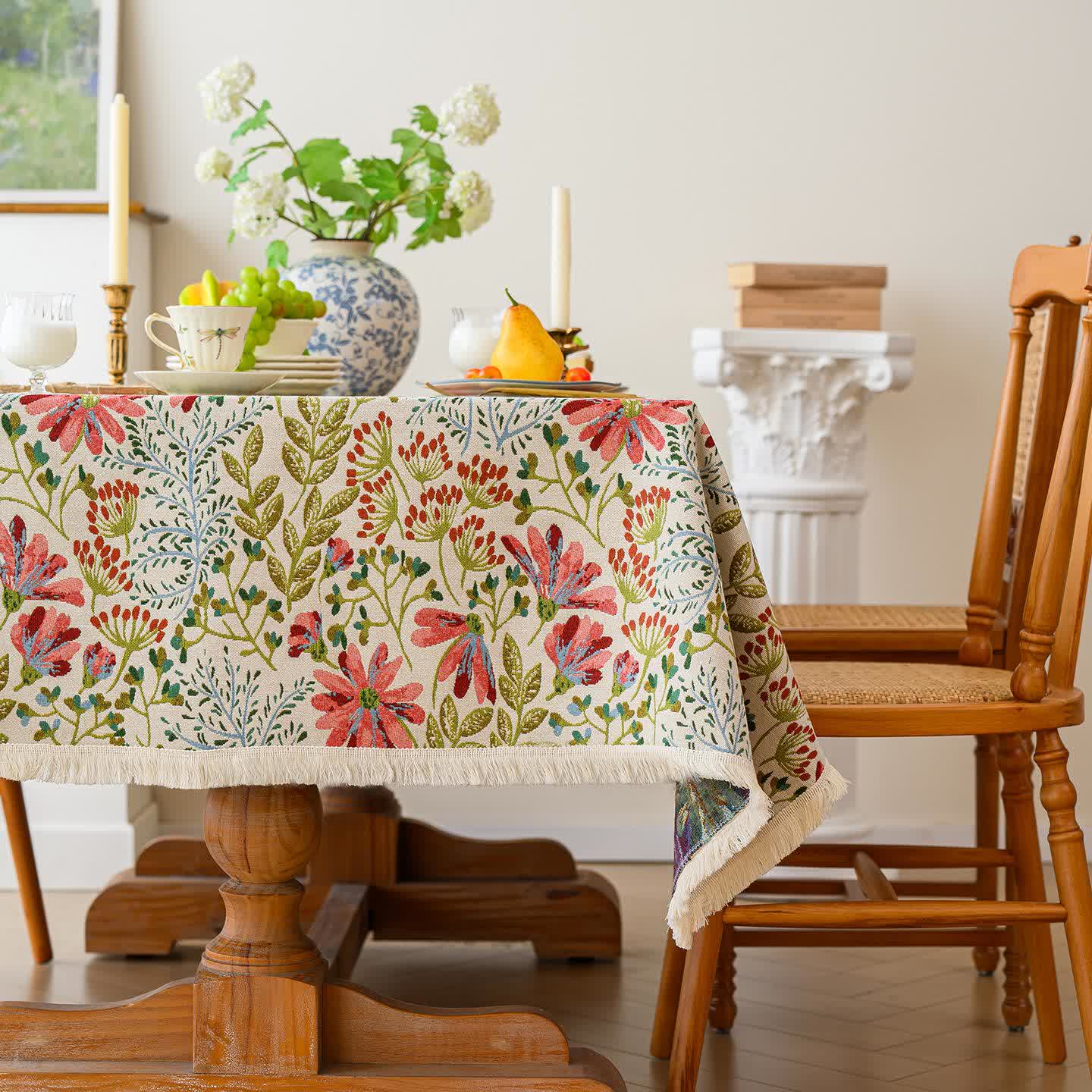 Nappe jacquard rustique à pompons et motif floral - image 2