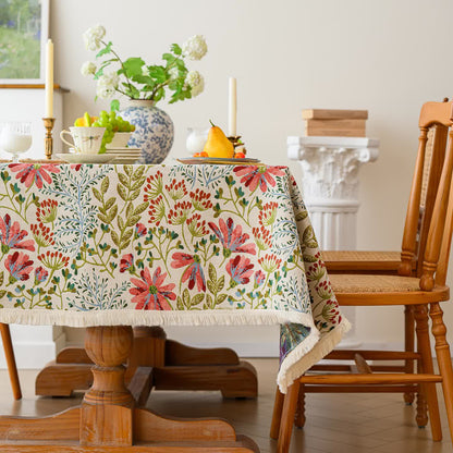 Nappe jacquard rustique à pompons et motif floral - image 2