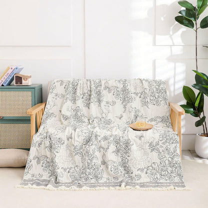 Couette en gaze de coton avec pompons et motif floral pastel - image 2