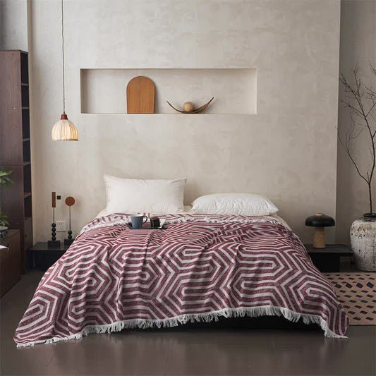 Couette réversible en coton avec pompons et motif à carreaux style jacquard - image 1