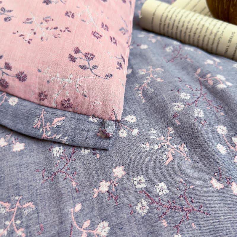 Couette jacquard en gaze de coton à motif floral de branches - image 1