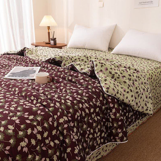 Couette jacquard en gaze de coton avec des feuilles botaniques - image 0