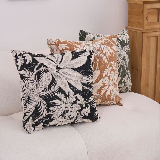 Coussin décoratif à motif de feuilles tropicales - image 0