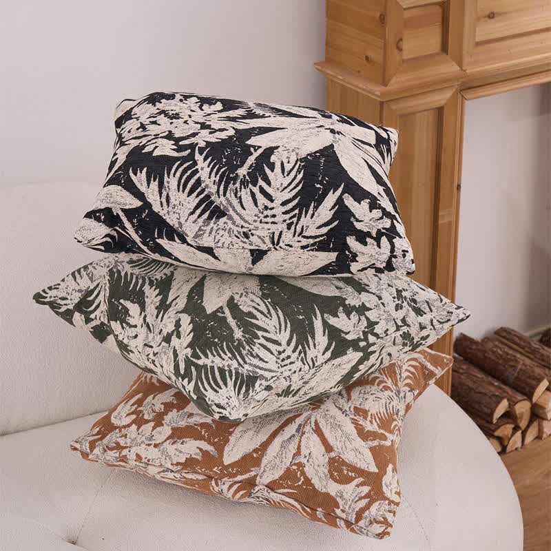 Coussin décoratif à motif de feuilles tropicales - image 3