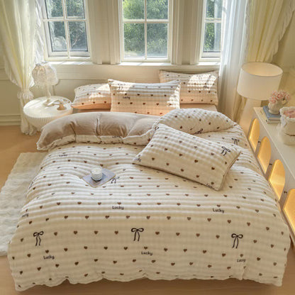 Parure de lit chaleureuse avec nœud en forme de cœur et peluche - image 1