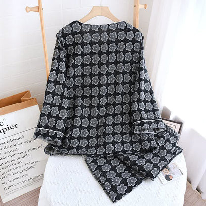 Pyjama en coton jacquard noir à motif floral - image 1