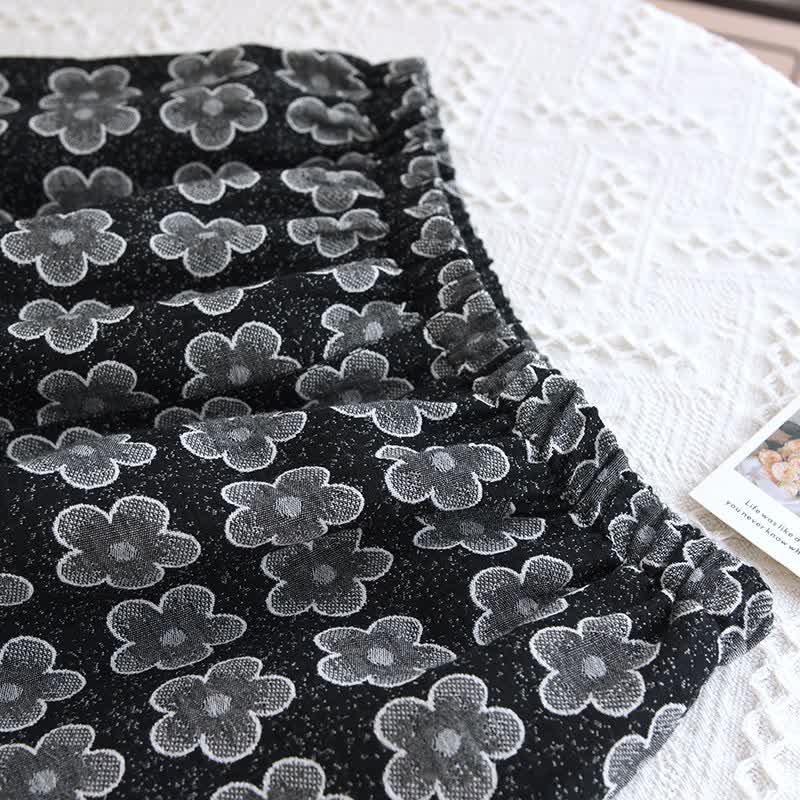 Pyjama en coton jacquard noir à motif floral - image 7