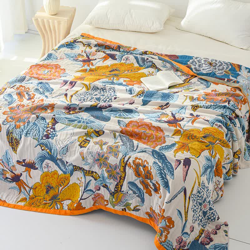 Couette réversible en gaze de coton à motif floral épanoui - image 1