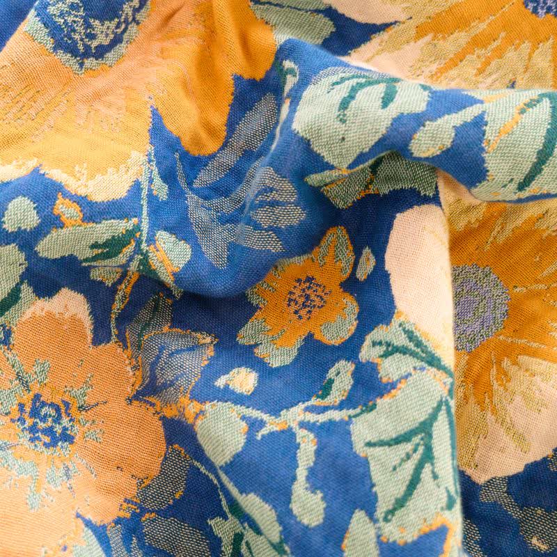 Couverture en gaze de coton avec pompons et un léger motif de marguerites - image 4