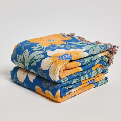 Couverture en gaze de coton avec pompons et un léger motif de marguerites - image 3