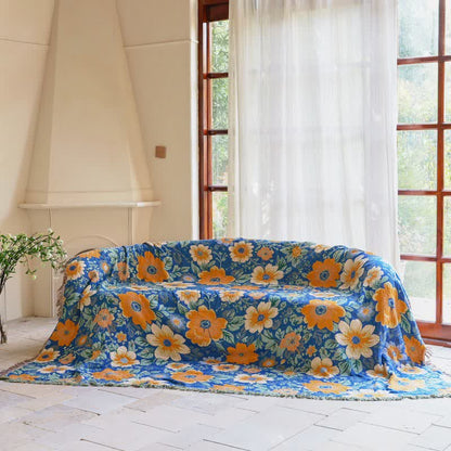 Couverture en gaze de coton avec pompons et un léger motif de marguerites - image 1