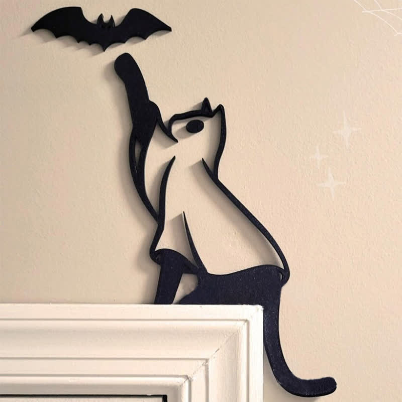 Décoration de cadre de porte avec une chauve-souris noire - image 0