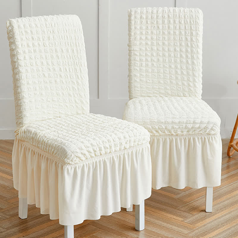 Housse de chaise extensible en seersucker avec ourlet volanté - image 2