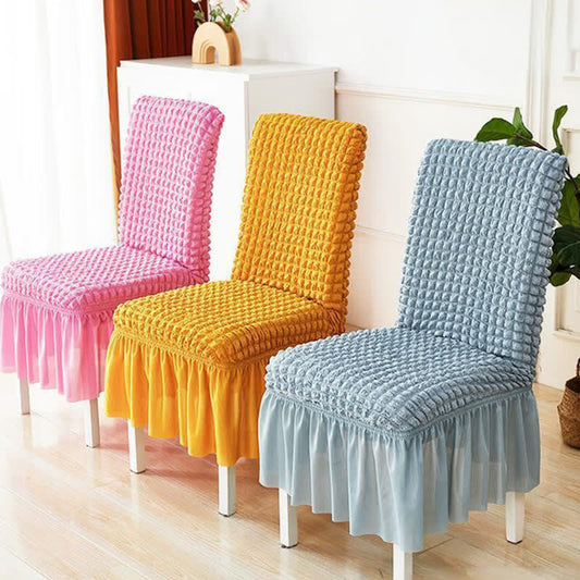 Housse de chaise extensible en seersucker avec ourlet volanté - image 0