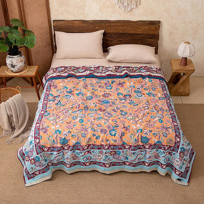 Couette en gaze de coton bleue à motif floral - image 1
