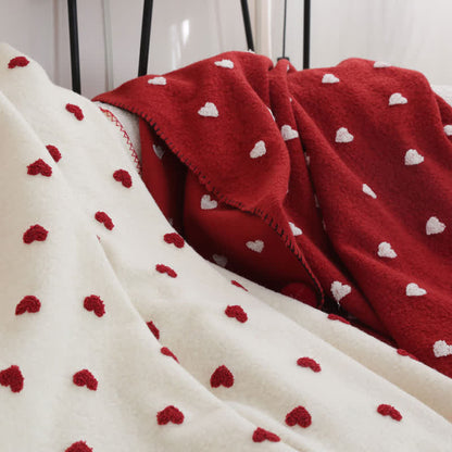 Couverture douce en forme de cœur avec des pompons - image 1