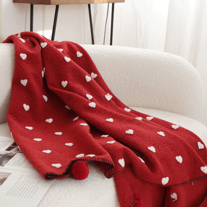 Couverture douce en forme de cœur avec des pompons - image 10