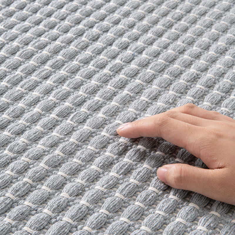 Tapis de bain tissé à pompons - image 5