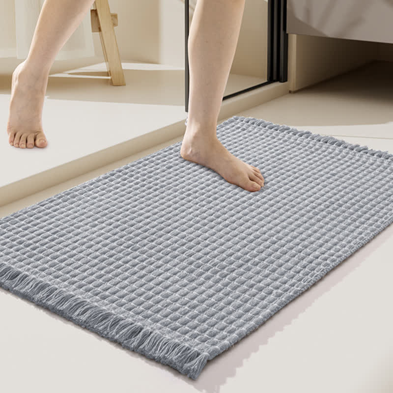 Tapis de bain tissé à pompons - image 2