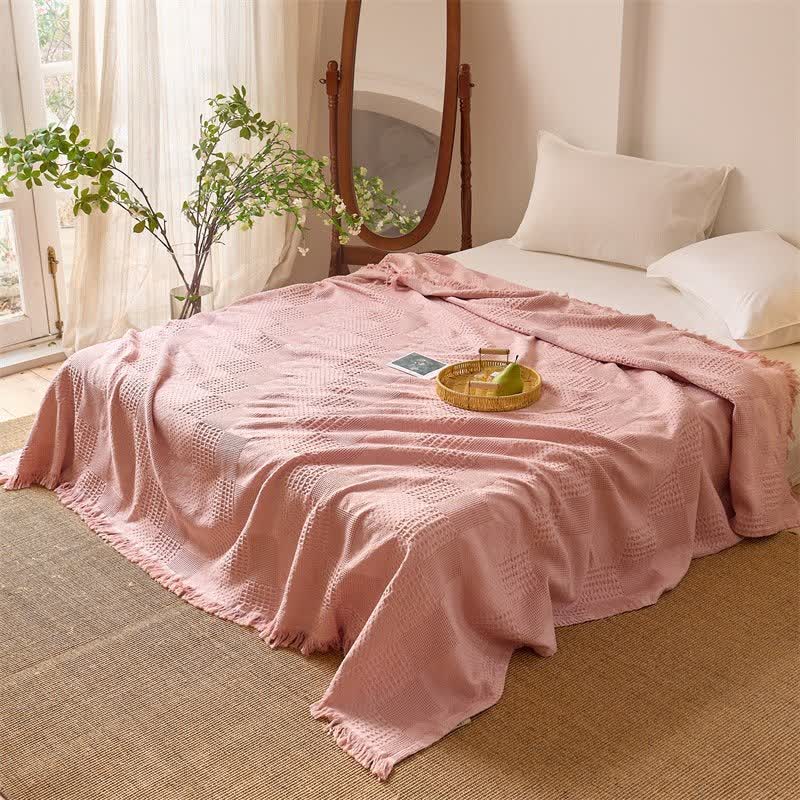 Couverture matelassée en coton avec bordure en piqué gaufré et pompons - image 0