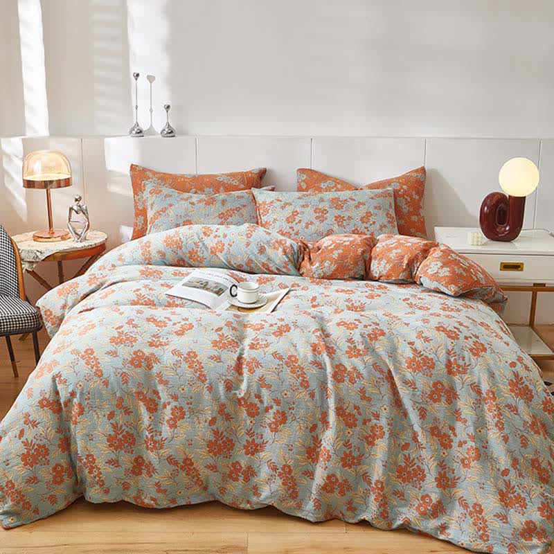 Linge de lit en double gaze de coton orange à motif floral - image 1