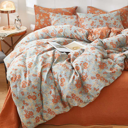 Linge de lit en double gaze de coton orange à motif floral - image 2