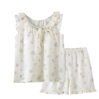 Pyjama en gaze de coton avec motifs de lapins et de fleurs. - image 2