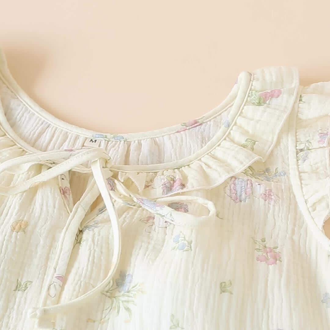 Pyjama en gaze de coton avec motifs de lapins et de fleurs. - image 1