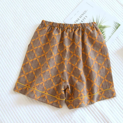 Short de pyjama jaune à carreaux en gaze de coton - image 1