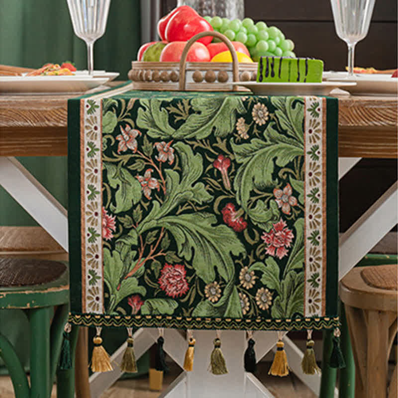 Chemin de table à motif jacquard de feuilles tropicales et à pompons - image 2