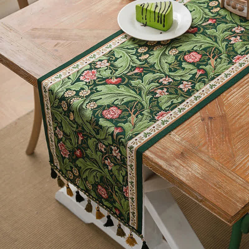 Chemin de table à motif jacquard de feuilles tropicales et à pompons - 35 cm x 300 cm - image 0