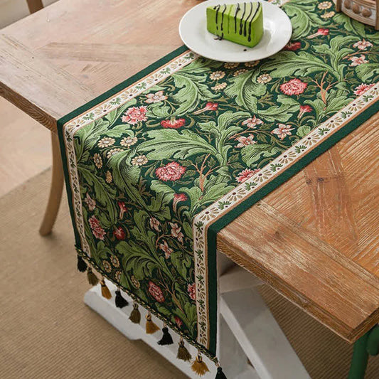 Chemin de table à motif jacquard de feuilles tropicales et à pompons - 35 cm x 300 cm - image 0