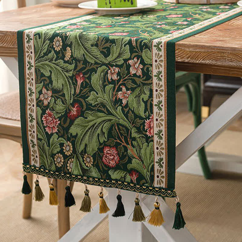 Chemin de table à motif jacquard de feuilles tropicales et à pompons - image 3