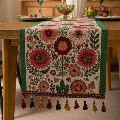 Chemin de table en jacquard rose à motif floral avec pompons - image 1