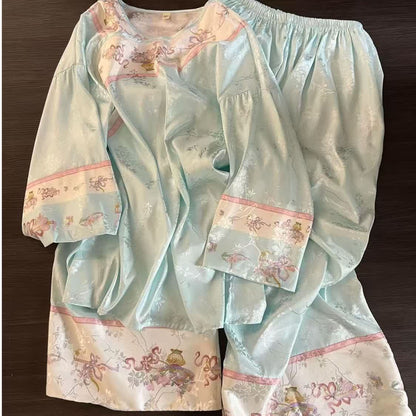 Pyjama bleu clair de style vintage à motifs floraux - image 1
