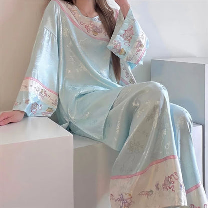Pyjama bleu clair de style vintage à motifs floraux - image 2