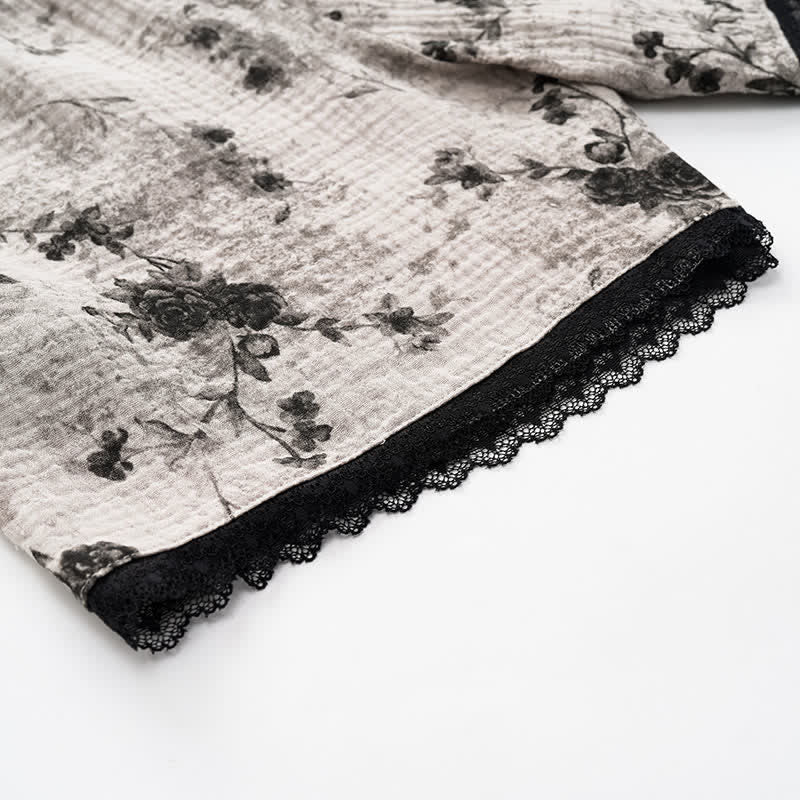 Pyjama noir composé d'un haut en coton à fleurs et d'un short - image 7